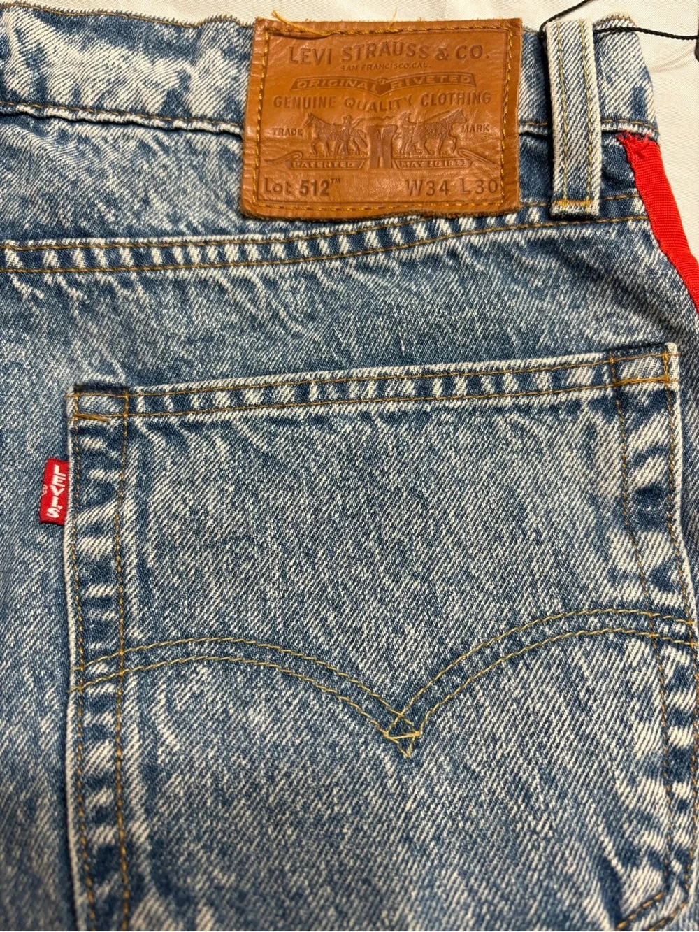 Levi's Light Blue Denim Jeans with Red Side Stripes